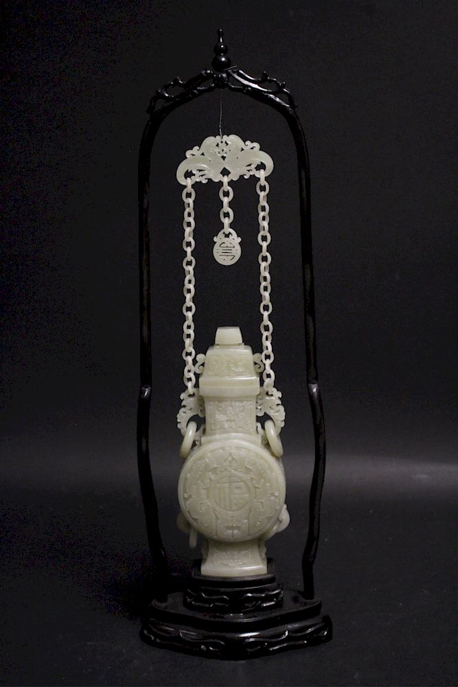 Appraisal: Chinese Celadon Jade Handing Carved Vase Moonflask shape loose ring