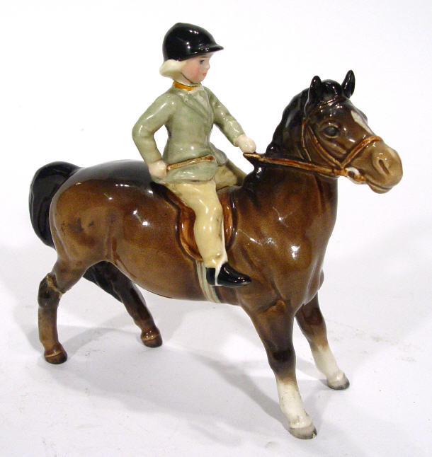 Appraisal: Hand painted Beswick girl on pony back printed factory mark