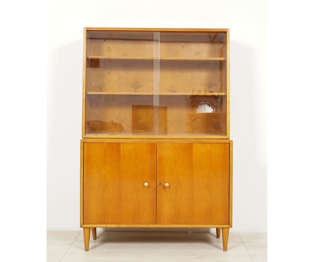 Appraisal: Mid-century modern two-piece cabinet with slant top glass front h