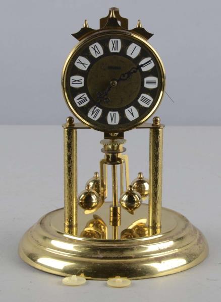 Appraisal: Haller Anniversary Clock Non-working Haller clock with spinning globes Two