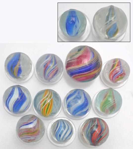 Appraisal: Lot of Jelly Core Type Swirl Marbles Description Includes semi-transparent