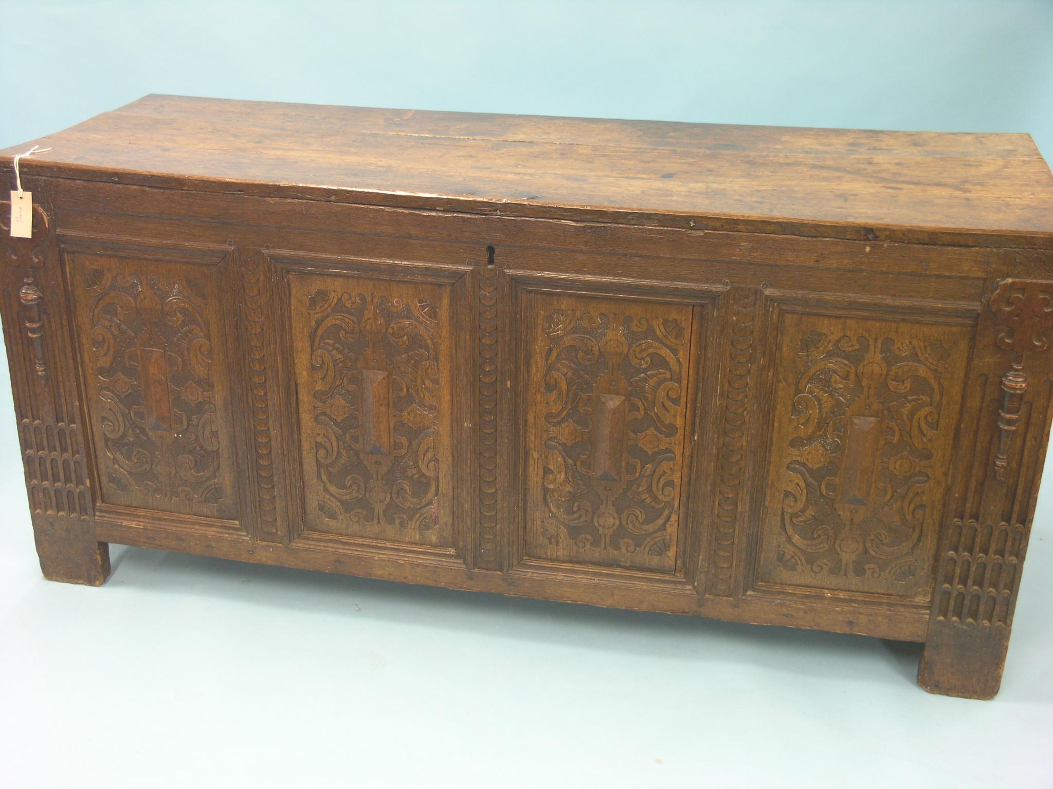 Appraisal: A large late th century oak coffer panelled construction with