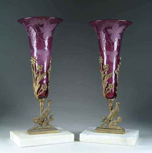 Appraisal: PAIR OF CUT AMETHYST GLASS EPERGNES IN FANCY FRAMES Removable