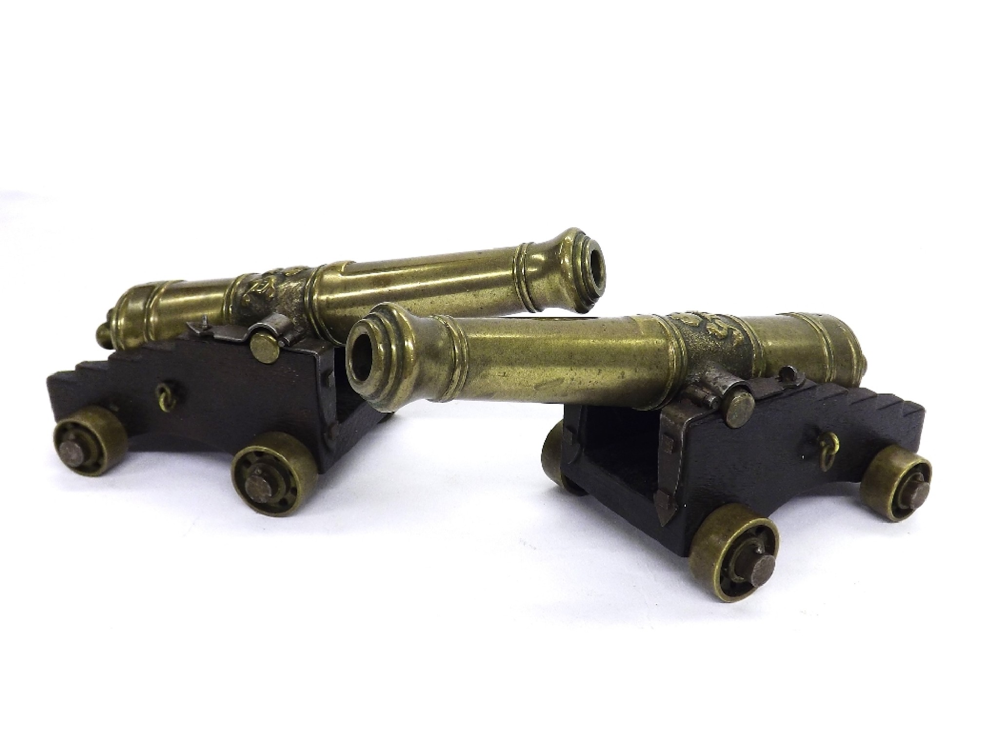 Appraisal: Pair of scale model miniature bronze cannons upon oak stands