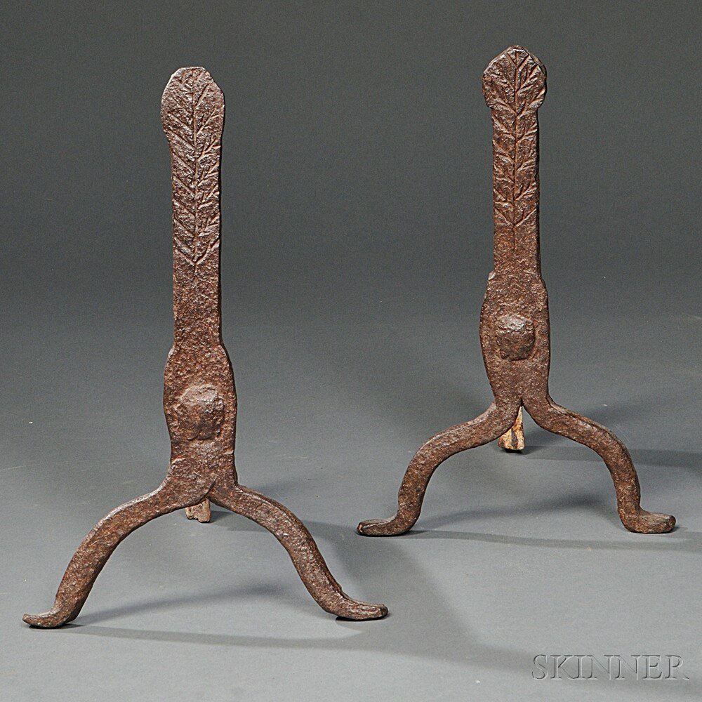 Appraisal: Pair of Small Cast Iron Andirons with Tree Decoration America