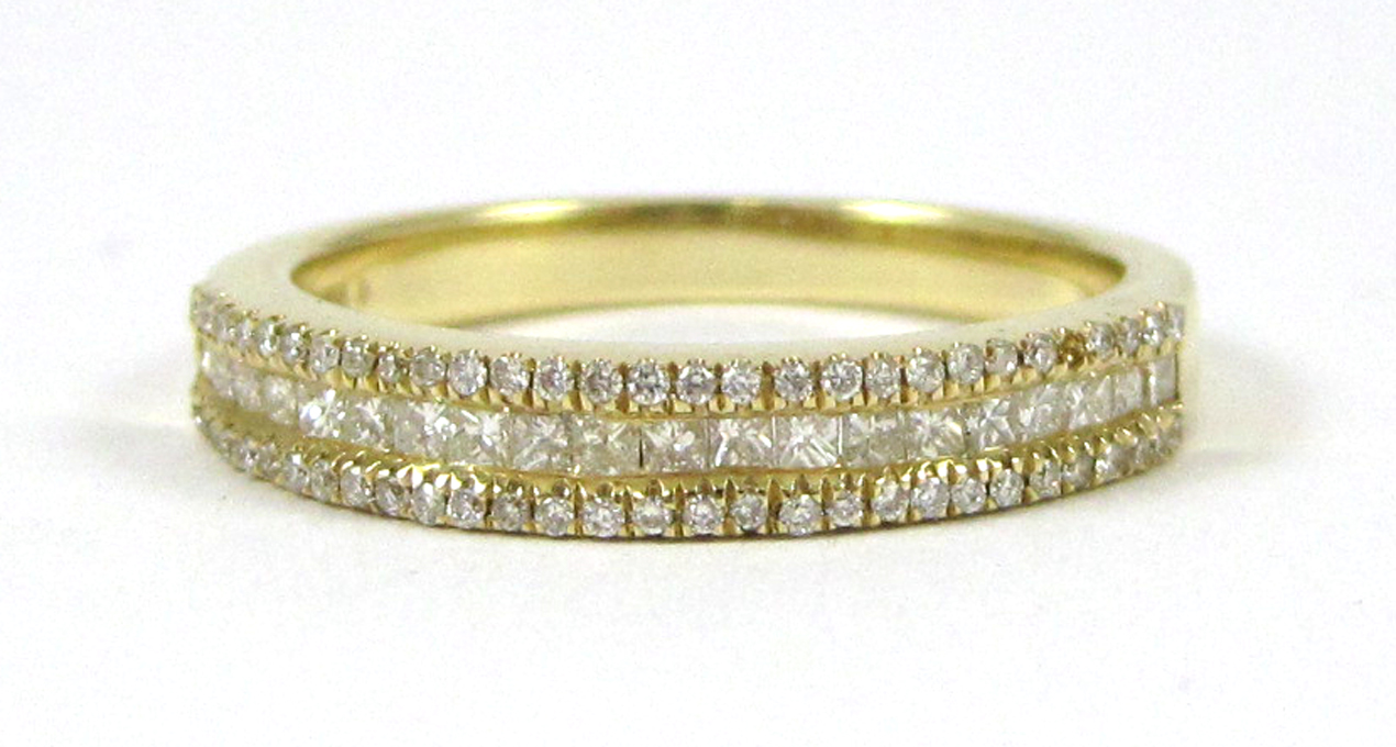 Appraisal: DIAMOND AND FOURTEEN KARAT GOLD RING with two rows of