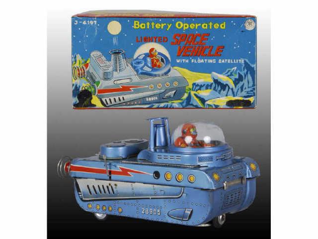 Appraisal: Japanese Battery-Operated Space Vehicle w Box Description Original box Working