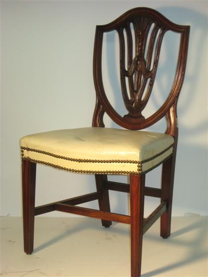 Appraisal: Set of eight Federal style mahogany sheild back dining chairs