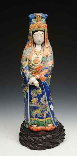 Appraisal: A JAPANESE POTTERY FIGURE OF A COURTLY FEMALE with decorative