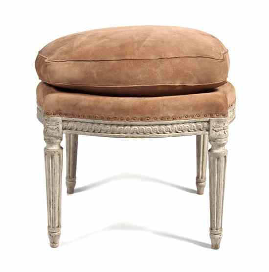 Appraisal: A Louis XVI Style Tabouret having a shaped suede cushion