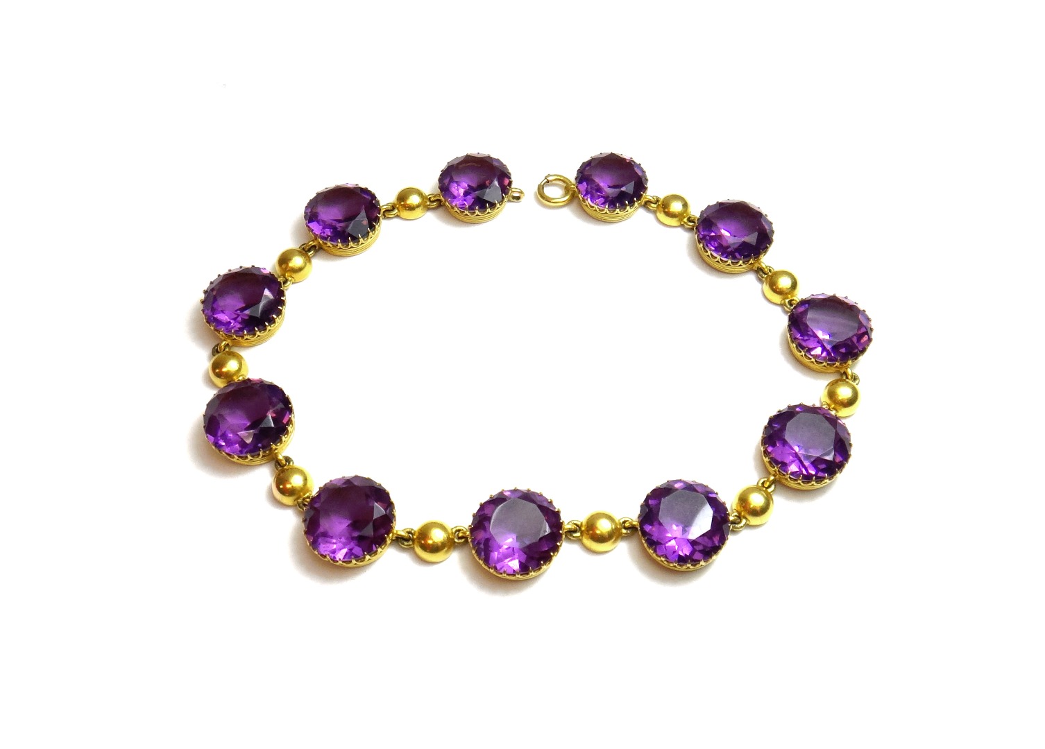 Appraisal: A Victorian amethyst coloured paste set choker necklace formed as