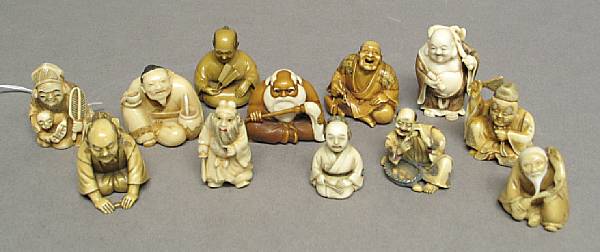 Appraisal: Twelve contemporary ivory netsuke Including Daruma with a fly whisk