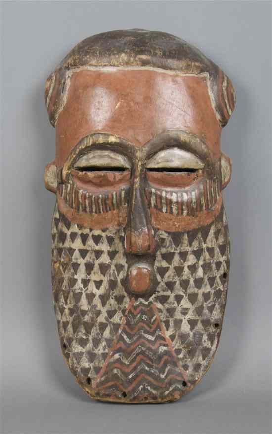 Appraisal: A Carved and Polychrome Decorated Mask Kuba depicting a bearded