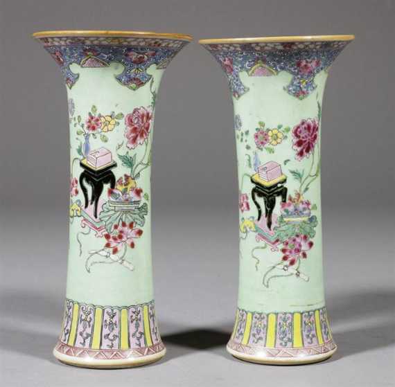 Appraisal: A PAIR OF BEAKER VASES DECORATED WITH FAMILLE ROSE ENAMELS