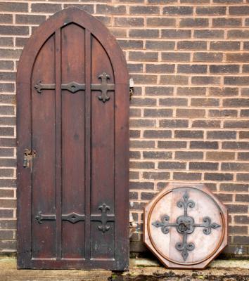 Appraisal: A late Victorian Gothic arch-top door with steel hinges stamped