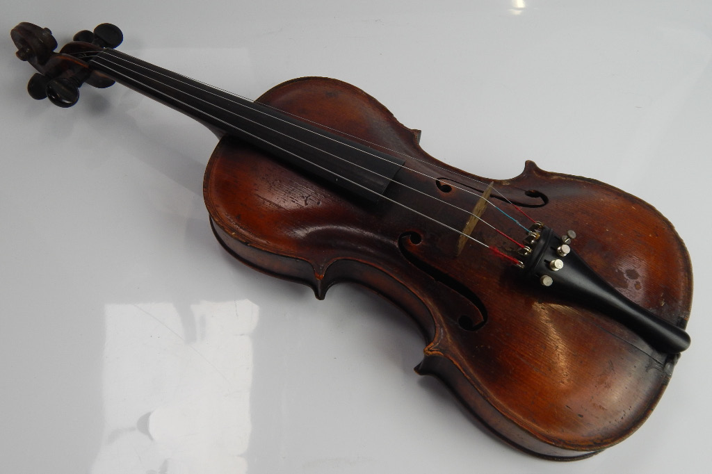 Appraisal: A thC violin with two piece figured back the interior