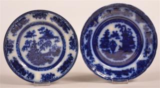 Appraisal: Two Flow Blue Transfer Decorated Plates Two Flow Blue Transfer