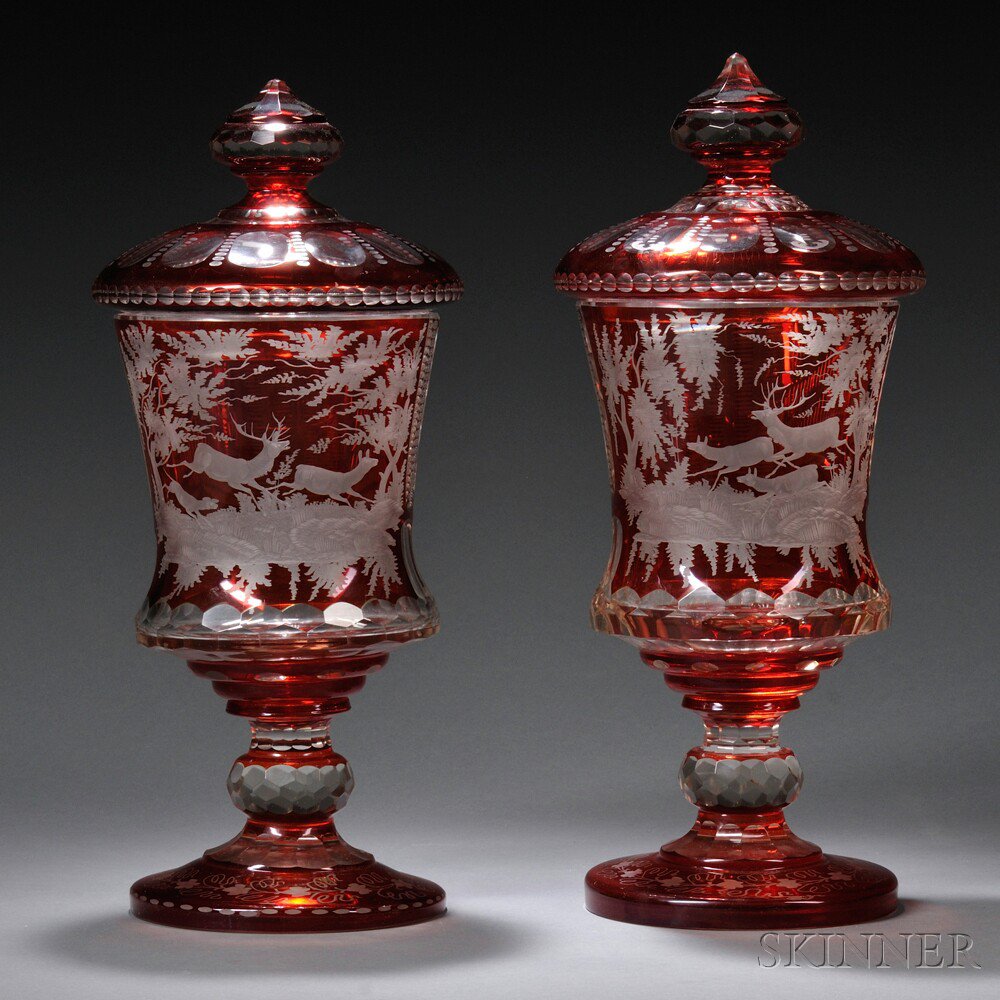 Appraisal: Pair of Bohemian Burnt Orange Flash Glass Jars and Covers