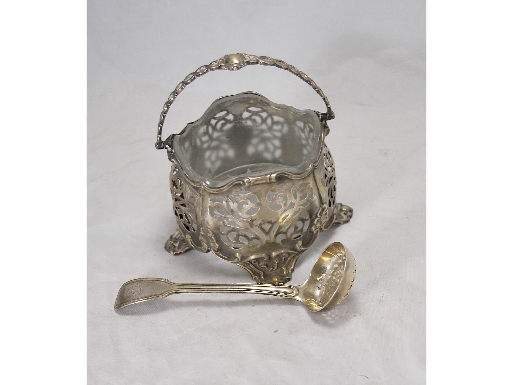 Appraisal: Victorian silver swing-handled pierced sugar basket having frosted glass liner