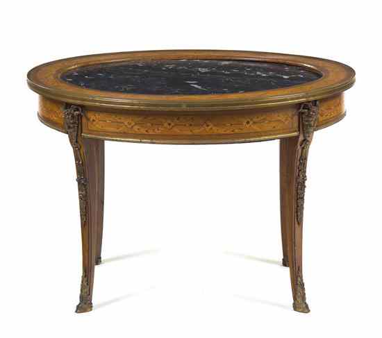 Appraisal: A Neoclassical Style Marble Inset Occasional Table of oval form