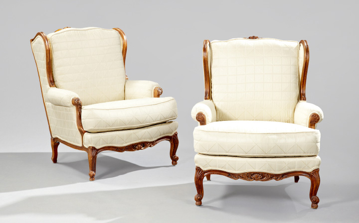 Appraisal: Handsome Pair of Louis XV-Style Carved Fruitwood Bergeres each with