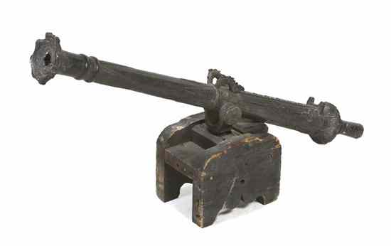 Appraisal: A Bronze Iron Cannon of typical form with foliate and