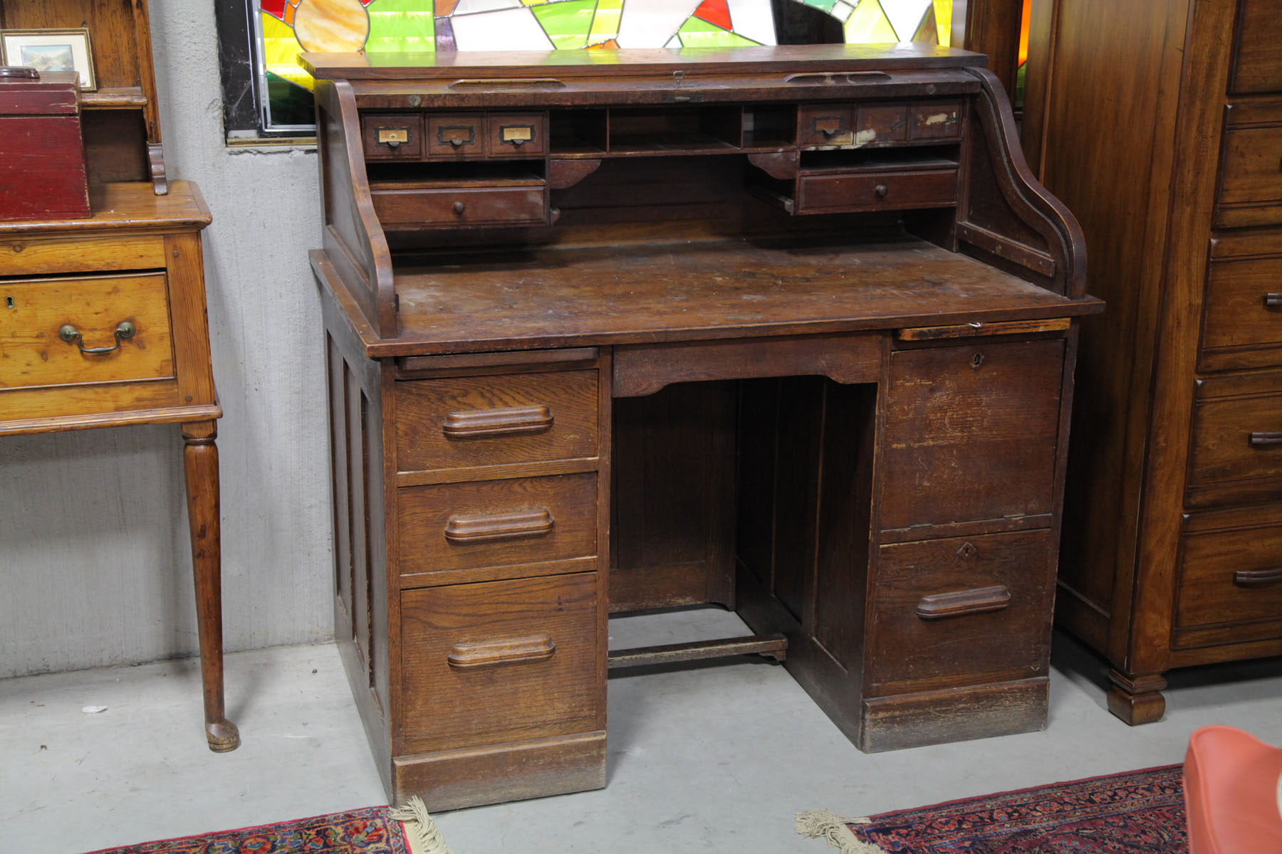 Appraisal: ROLL TOP DESK American early th century Oak roll top