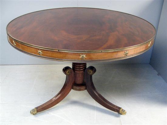 Appraisal: Circular drum top breakfast table with brass star decoration on