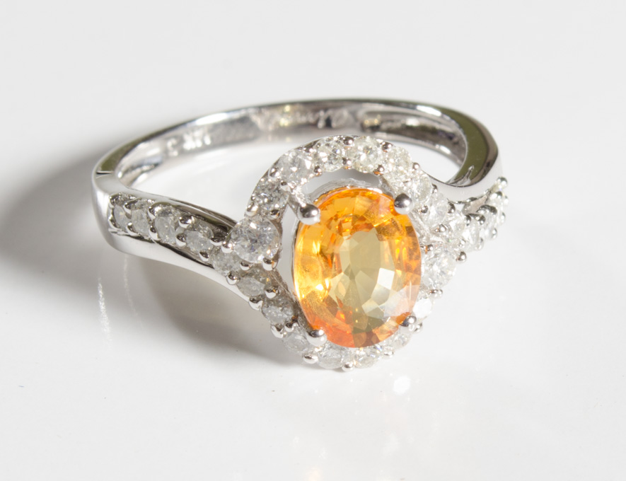 Appraisal: YELLOW SAPPHIRE DIAMOND AND WHITE GOLD RING The k white