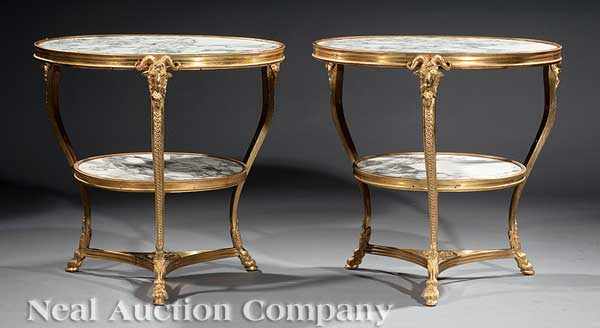 Appraisal: A Pair of Louis XVI-Style Dor Bronze Gu ridons each