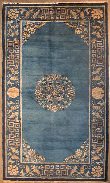 Appraisal: A Chinese rug size approximately ft in x ft in