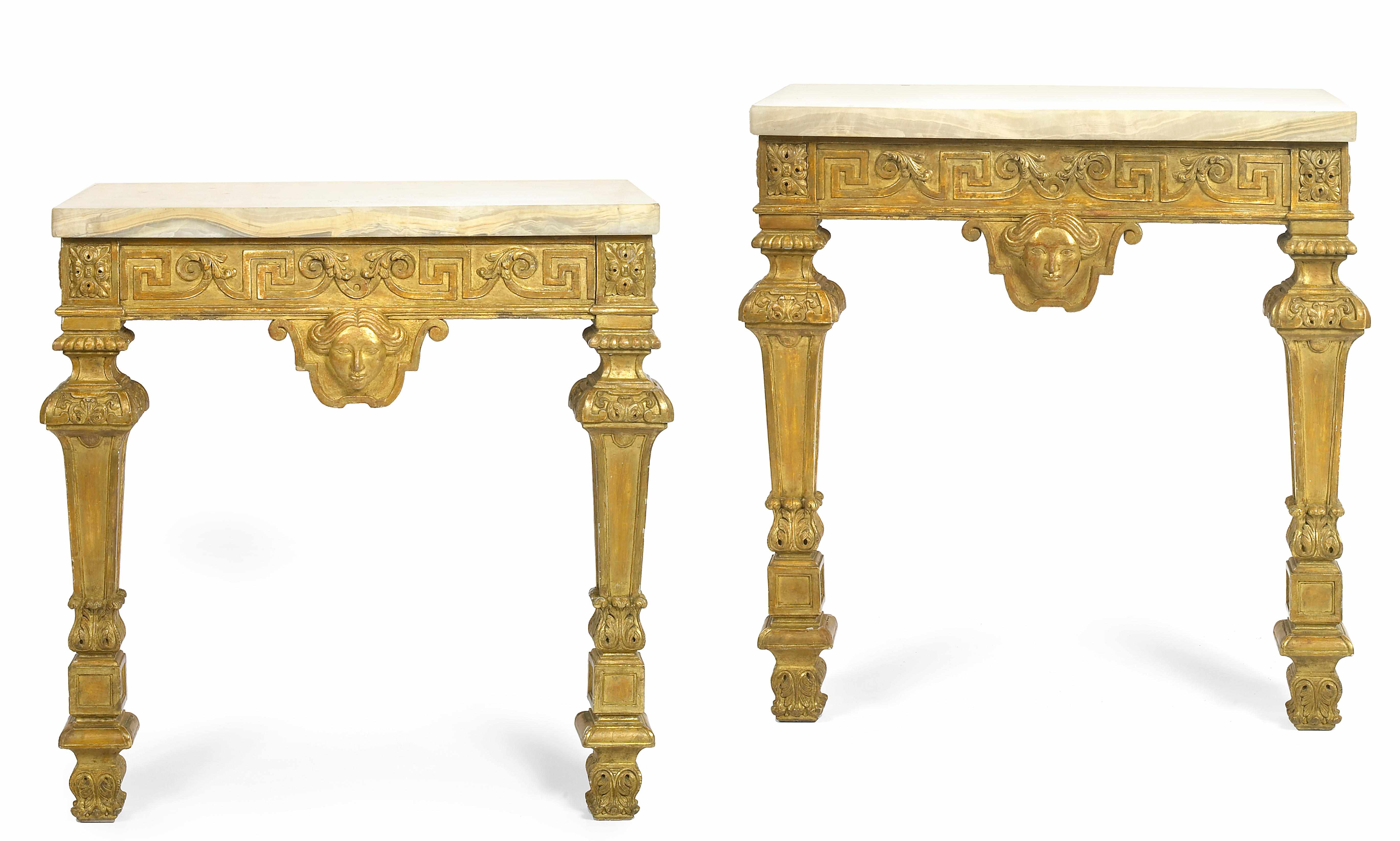 Appraisal: A pair of Louis XIV style carved giltwood consoles l