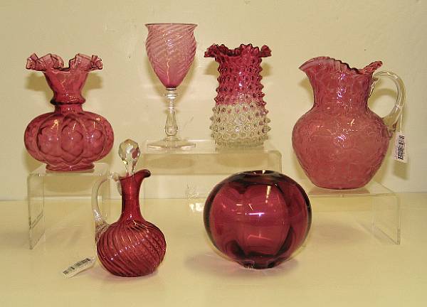 Appraisal: An assembled group of six pieces of Victorian cranberry glass