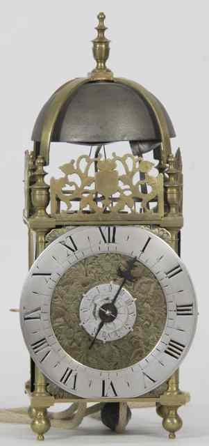 Appraisal: A brass lantern alarm clock of th Century design the