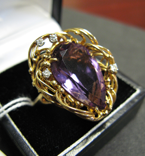 Appraisal: LARGE AMETHYST DIAMOND AND FOURTEEN KARAT GOLD RING set with