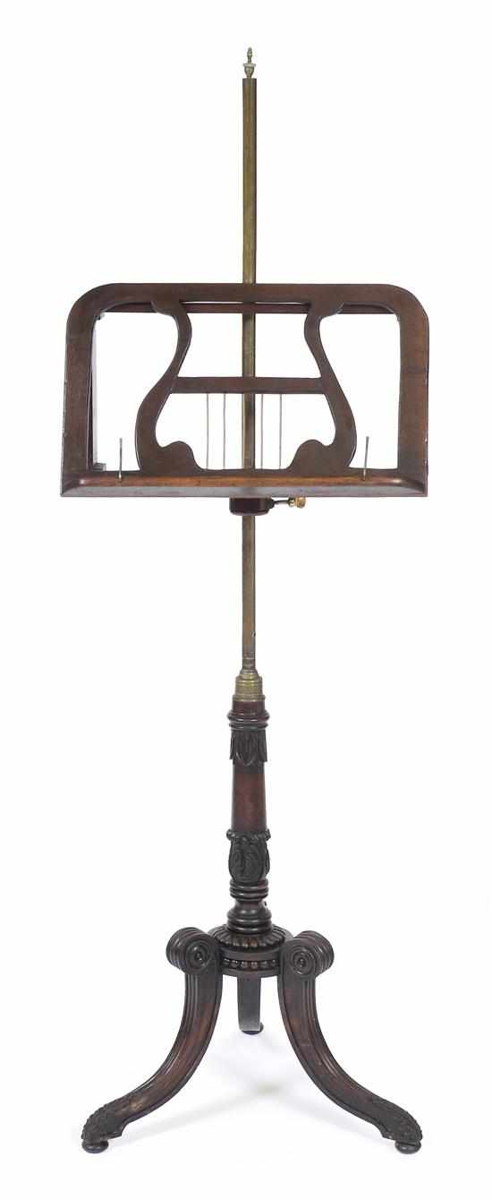 Appraisal: A TH CENTURY MAHOGANY MUSIC STAND The music stand pierced