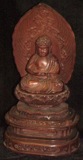 Appraisal: Shakyamuni carved wooden seated Buddha on lotus pedestal h