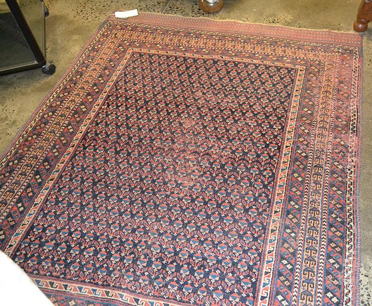 Appraisal: A SMALL CAUCASIAN RUG with a repeating chevron pattern on