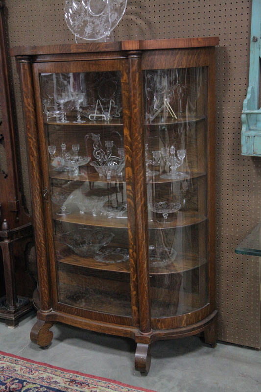 Appraisal: CHINA CABINET Oak having curved glass door and sides four