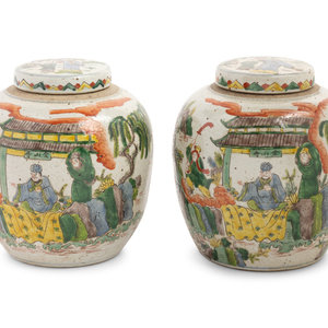 Appraisal: A Pair of Chinese Polychrome Glazed Lidded Ginger Jars Height