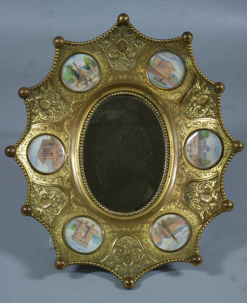 Appraisal: Gilt embossed brass hanging mirror with HP on ivory discs