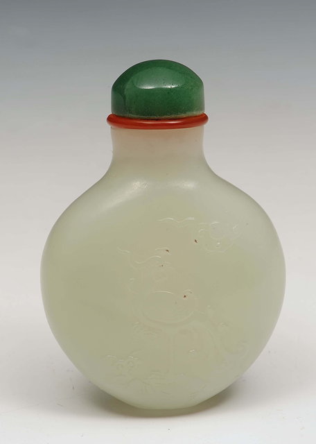 Appraisal: A Chinese mutton fat jade ovoid snuff bottle - carved