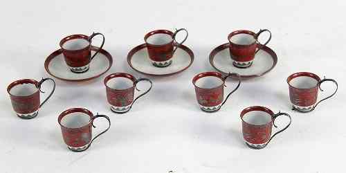 Appraisal: A Japanese Arita part tea service comprising nine cups six