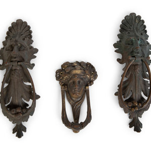 Appraisal: A Group of Three Continental Patinated Metal Door Knockers TH