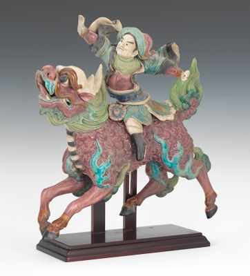 Appraisal: Chinese Figural Ceramic Roof Ornament A warrior riding a mythical