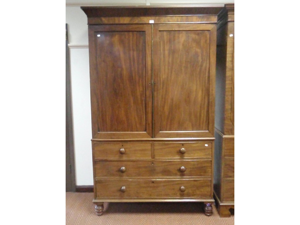 Appraisal: A Victorian mahogany linen press with moulded cornice the upper