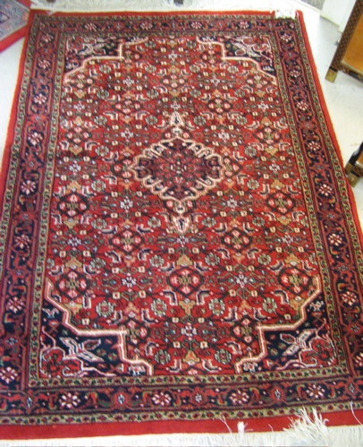 Appraisal: HAND KNOTTED ORIENTAL AREA RUG Indo-Bidjar small central medallion and