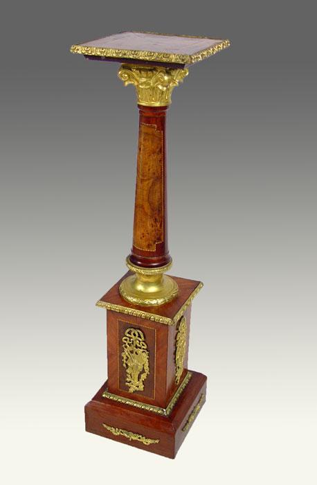 Appraisal: FRENCH EMPIRE INLAY AND ORMOLU PEDESTAL Segmented pedestal with double