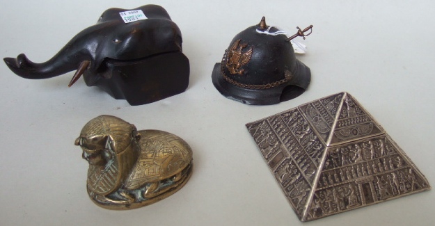 Appraisal: Four novelty inkwells early th century including a brass inkwell