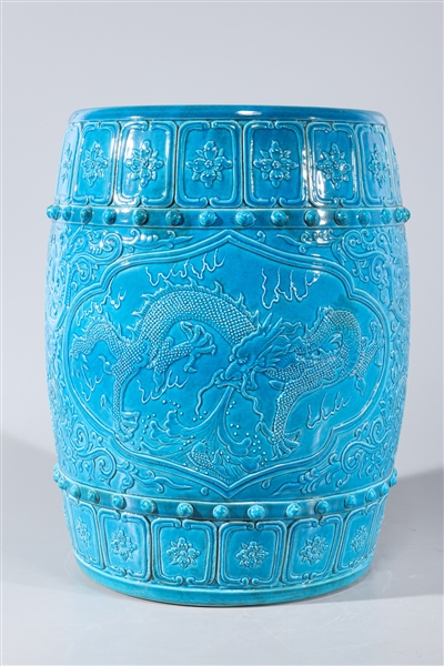 Appraisal: Chinese blue glazed porcelain garden seat with molded dragons and